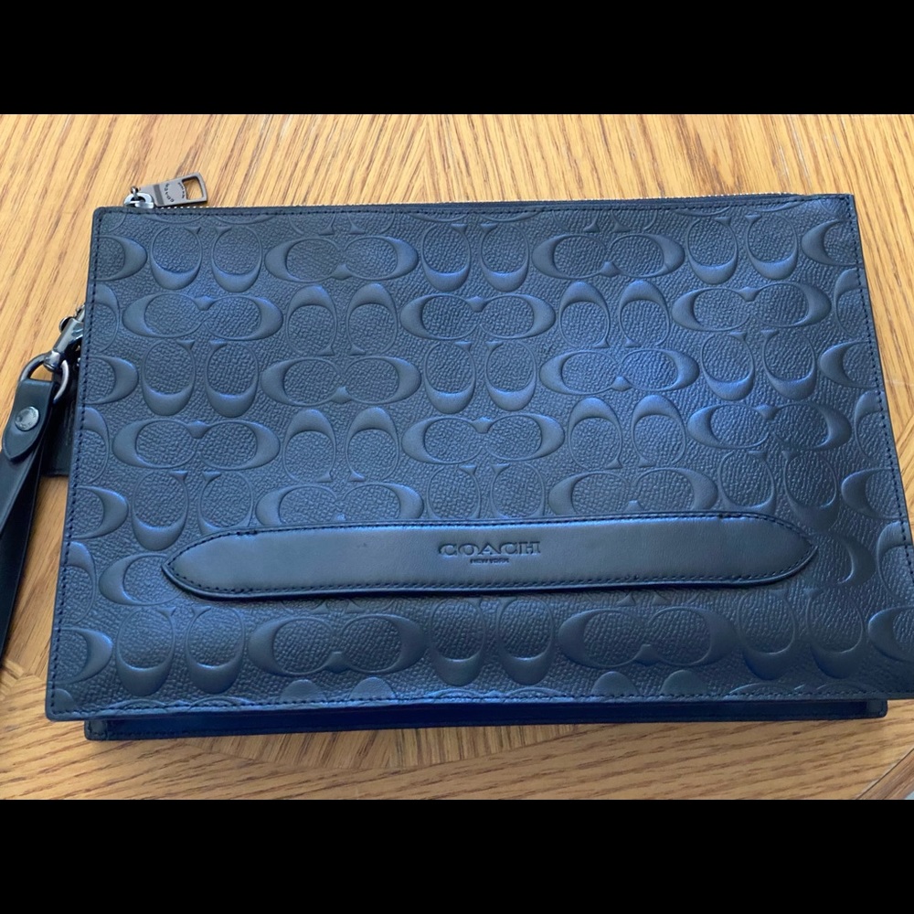 Coach carry all in signature embossed canvas.